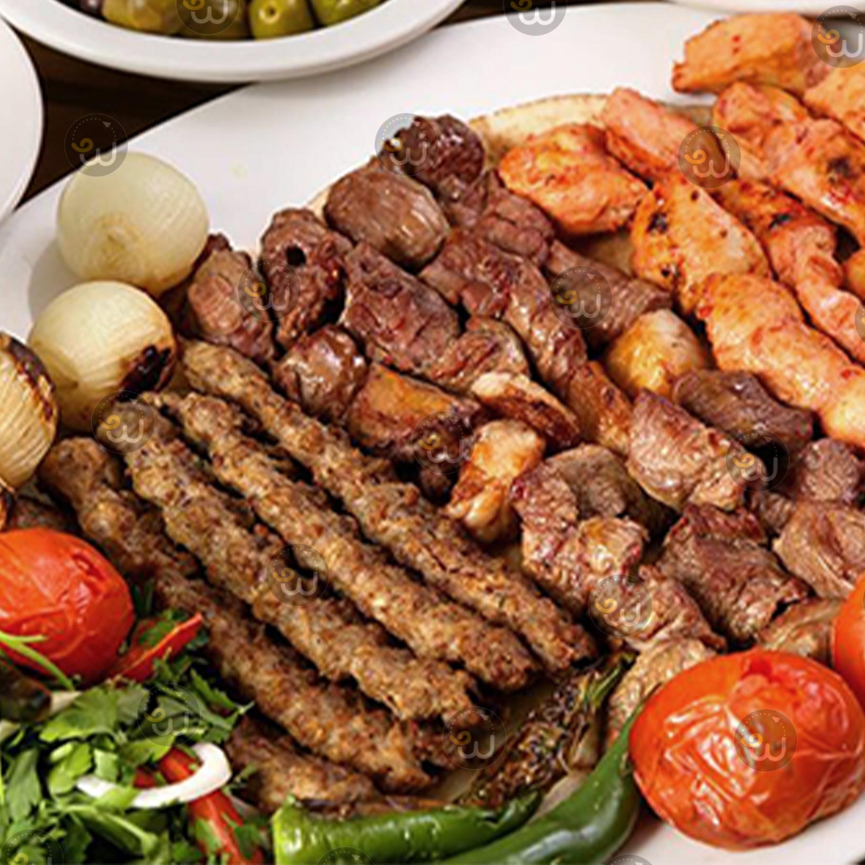 A kilo of meat kebab with a kilo of chicken kebab with a Turkish chicken
